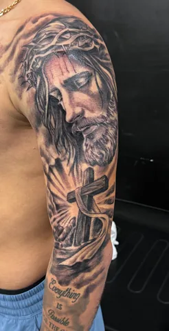 Featured tattoo by Jesus Garcia