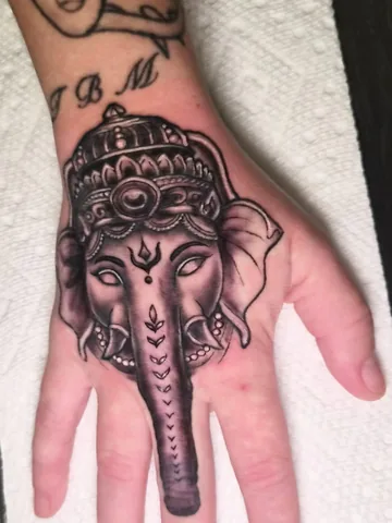 Featured tattoo by Parris